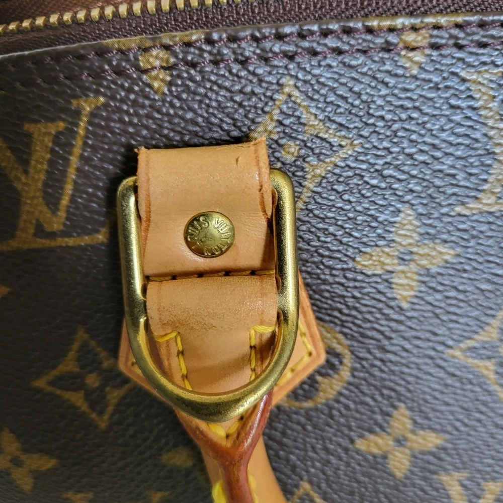 Authentic Louis Vuitton Monogram Alma PM Hand Bag..
